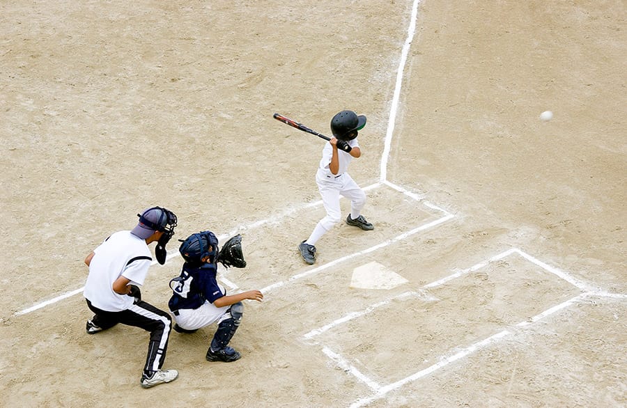 baseball game pitch at the plate