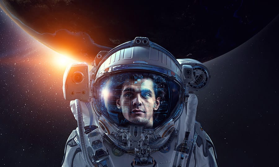 male astronaut with space background