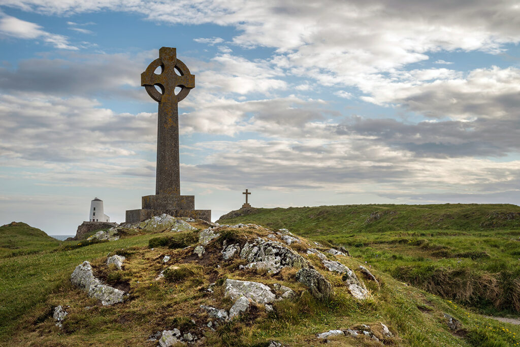 Celtic cross on a rocky landscape
